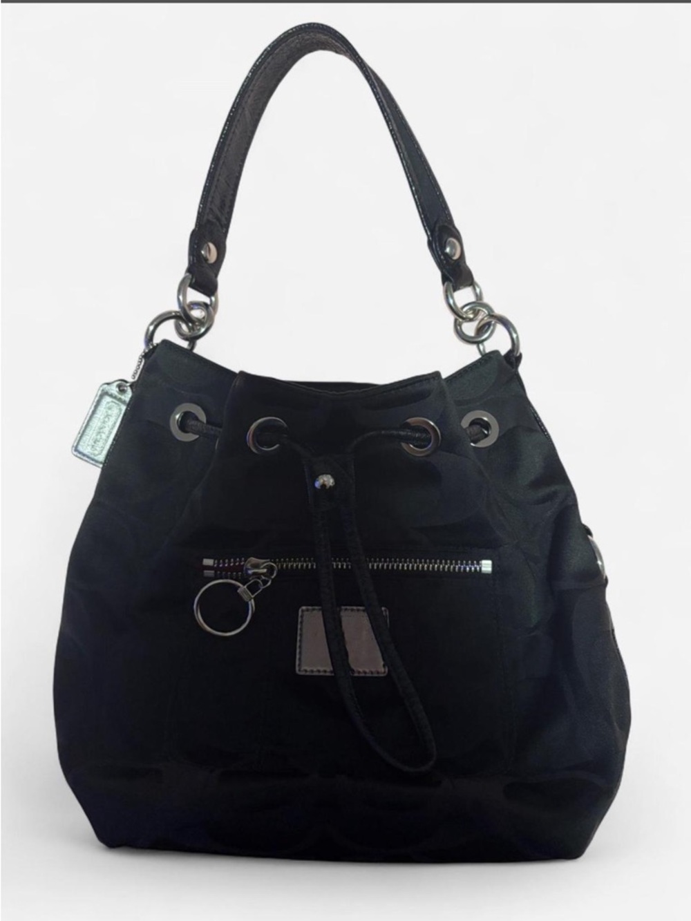 Vintage Y2K Coach Poppy drawstring bag with silver hardware